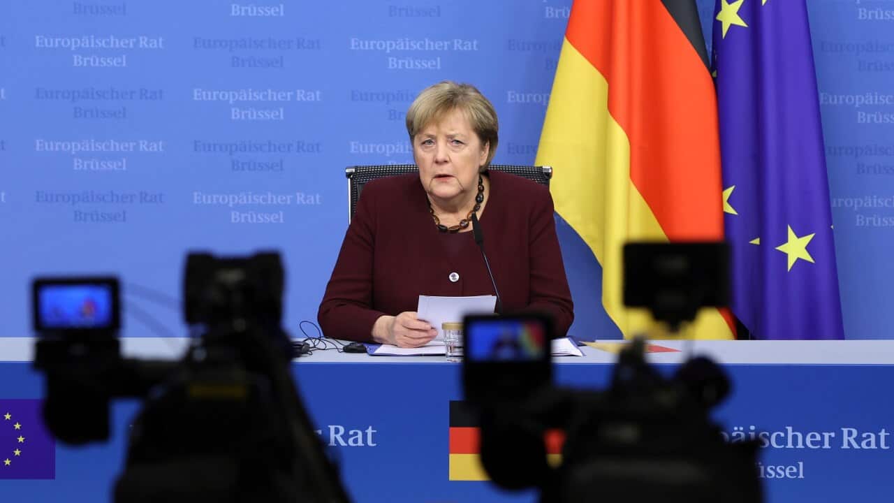 German Chancellor Angela Merkel speaks during a media conference at an EU summit in Brussels.