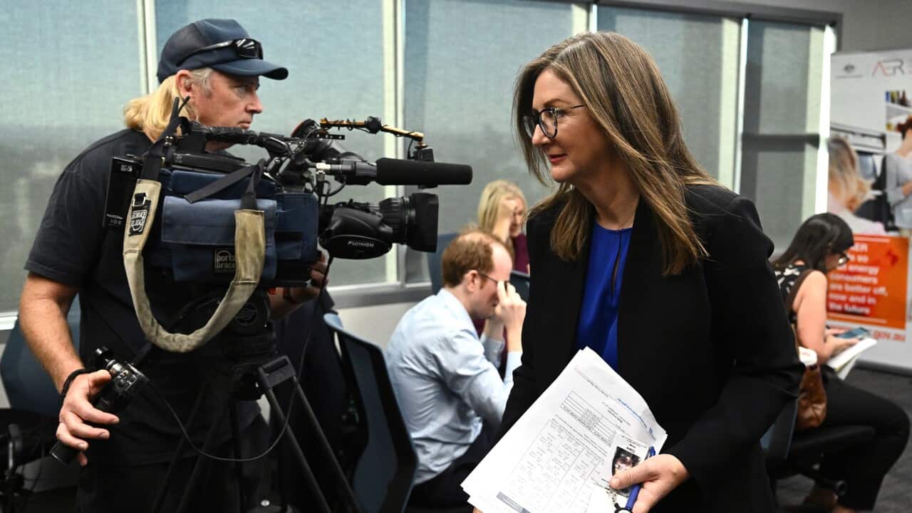 AER chair Clare Savage leaves after releasing its draft determination for the Default Market Offer (AAP).