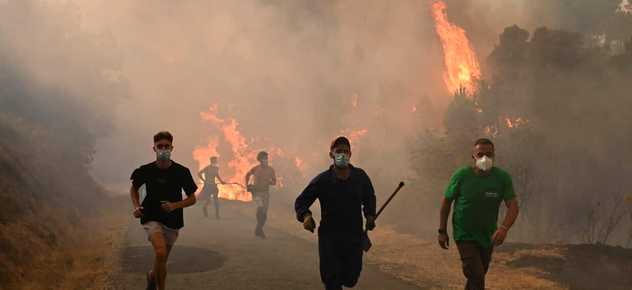 'Looks like doomsday': Wildfires fanned by heatwave and strong winds rage across Europe