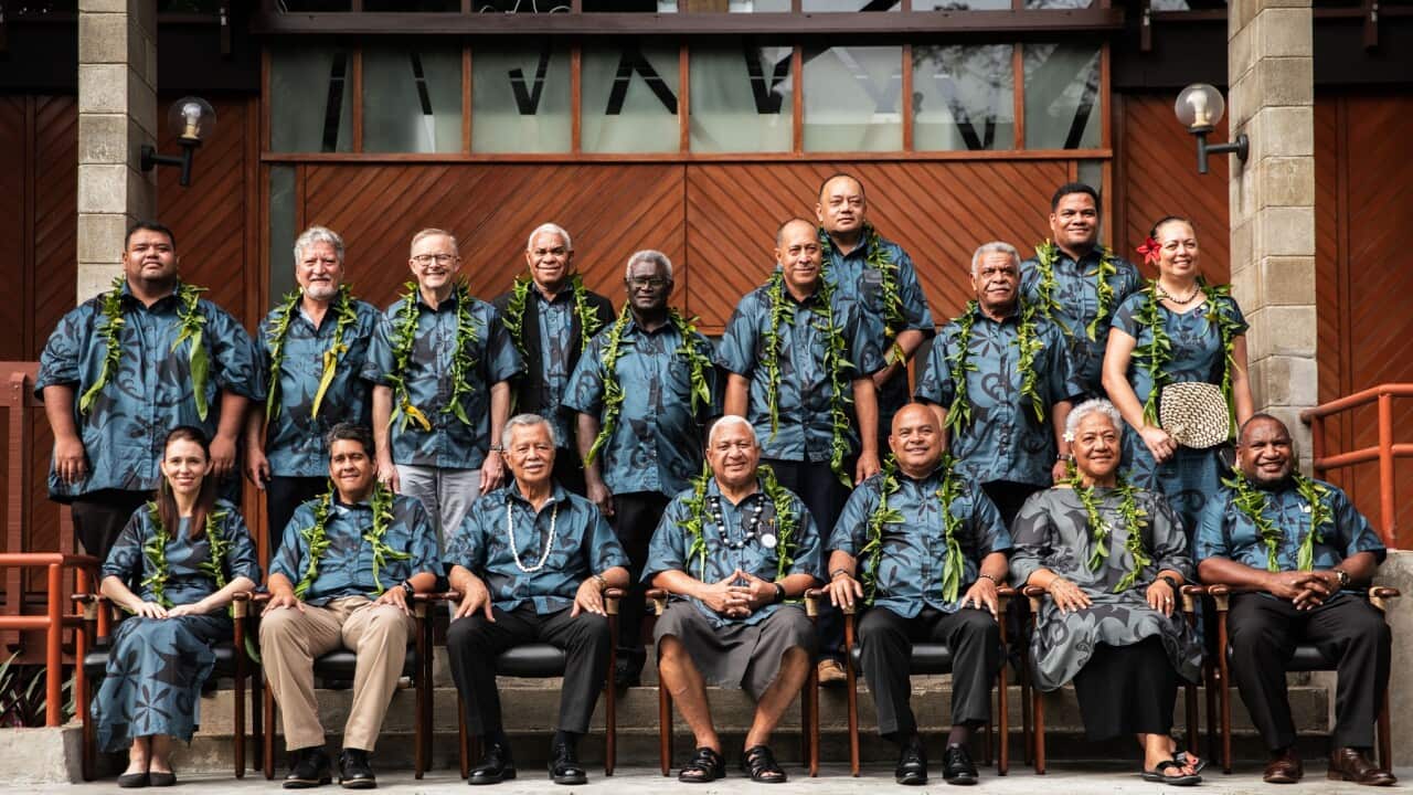 Attendees pose during the family photo at the Pacific Islands Forum leaders summit