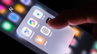 A folder on an iPhone labelled "AI", containing six apps including ChatGPT, Gemini and Claude