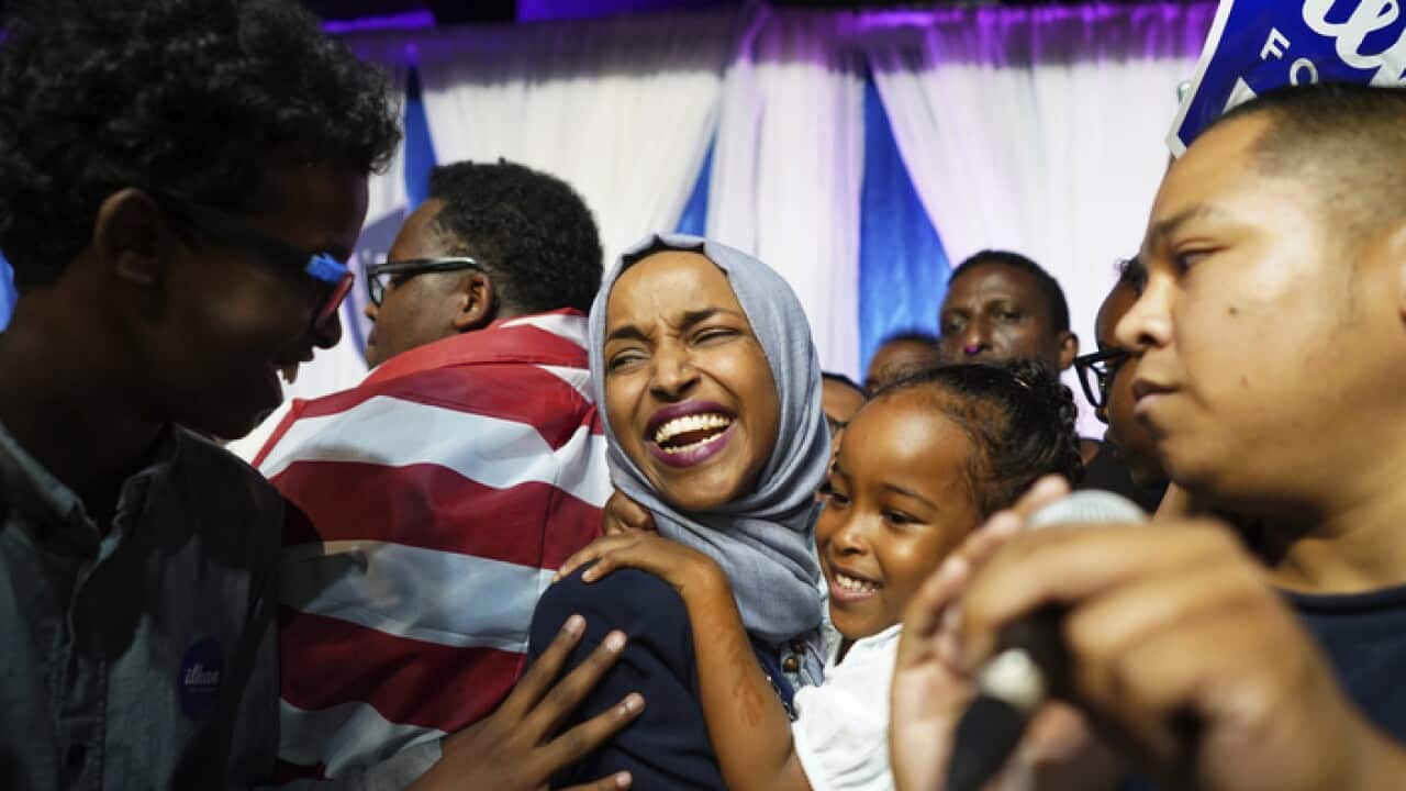 Minnesota Rep. Ilhan Omar, center, celebrates with her children after her Congressional 5th District primary victory, Tuesday, Aug. 14, 2018, in Minneapolis. (Mark Vancleave/Star Tribune via AP)