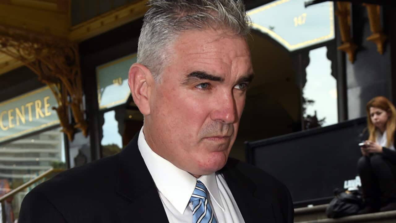 Robert Reid leaves court.