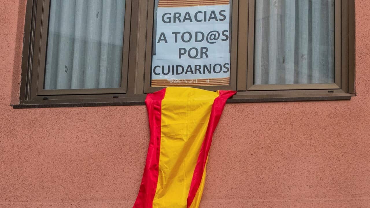 A banners that reads 'Thank you all for taking care of us' hangs in Zaragoza, Spain.