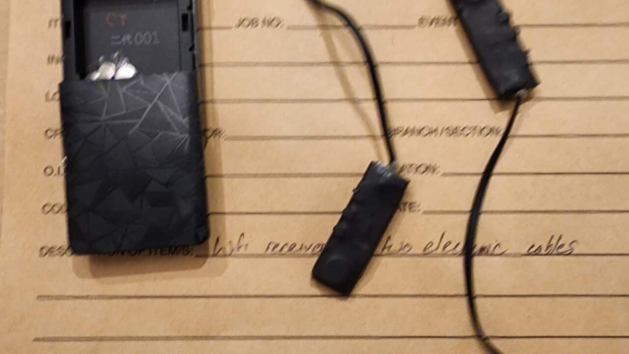 A small microphone with an attachment 