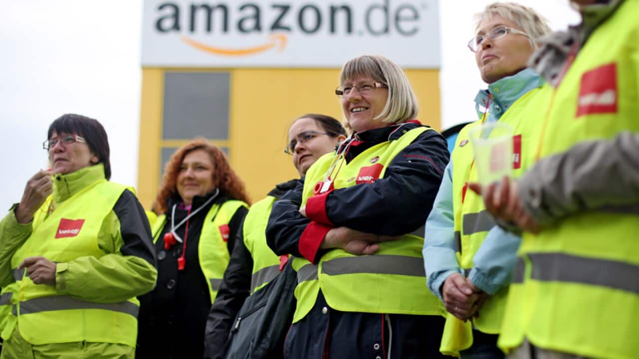 Amazon employees outside the logistic centre in Leipzig
