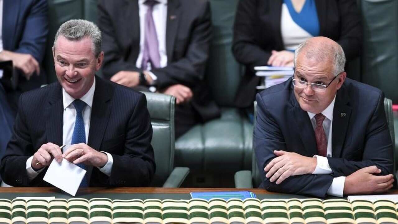Scott Morrison (right) speaks to Defence Minister Christopher Pyne