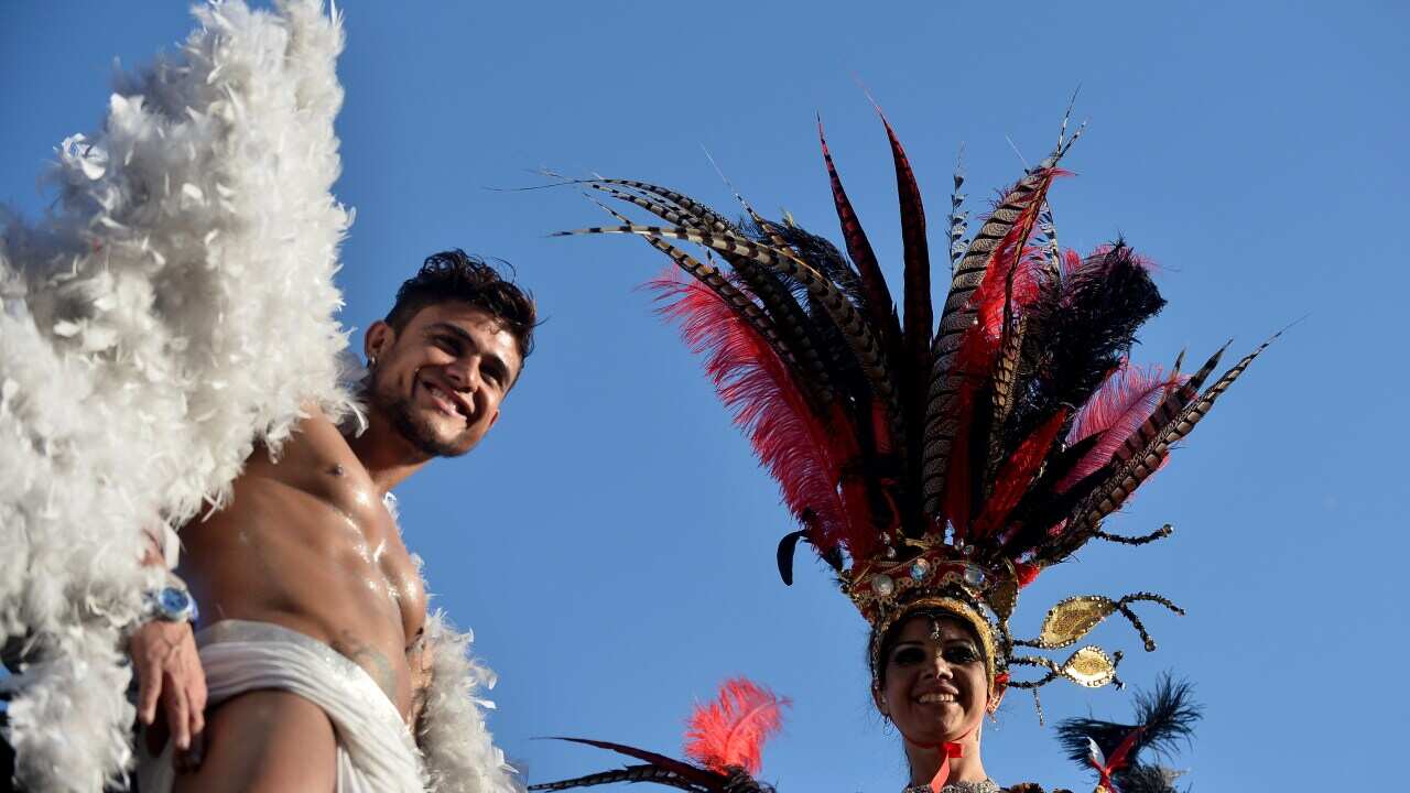 Tens of thousands have taken to the streets of Rome for the city's annual Gay Pride parade.