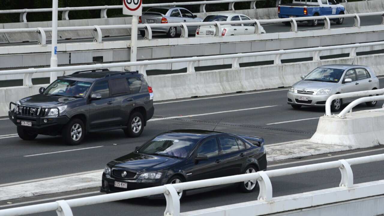 Car drive along a freeway.
