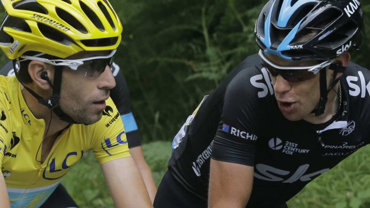 Richie Porte (r) and Vincenzo Nibali ride in the Tour De France.