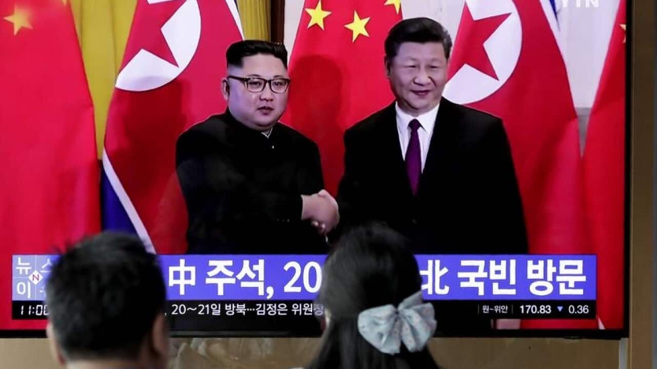 Chinese President Xi Jinping and North Korean leader Kim Jong Un,