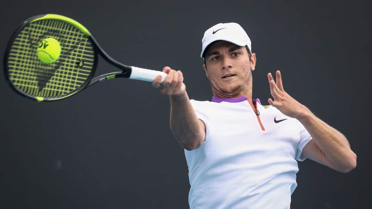 Miomir Kecmanovic of Serbia in action against Kamil Majchrzak of Poland during the men's singles tennis first round match at the Australian Open Grand Slam at Melbourne Park in Melbourne, Australia, 08 February 2021. EPA/JASON O'BRIEN