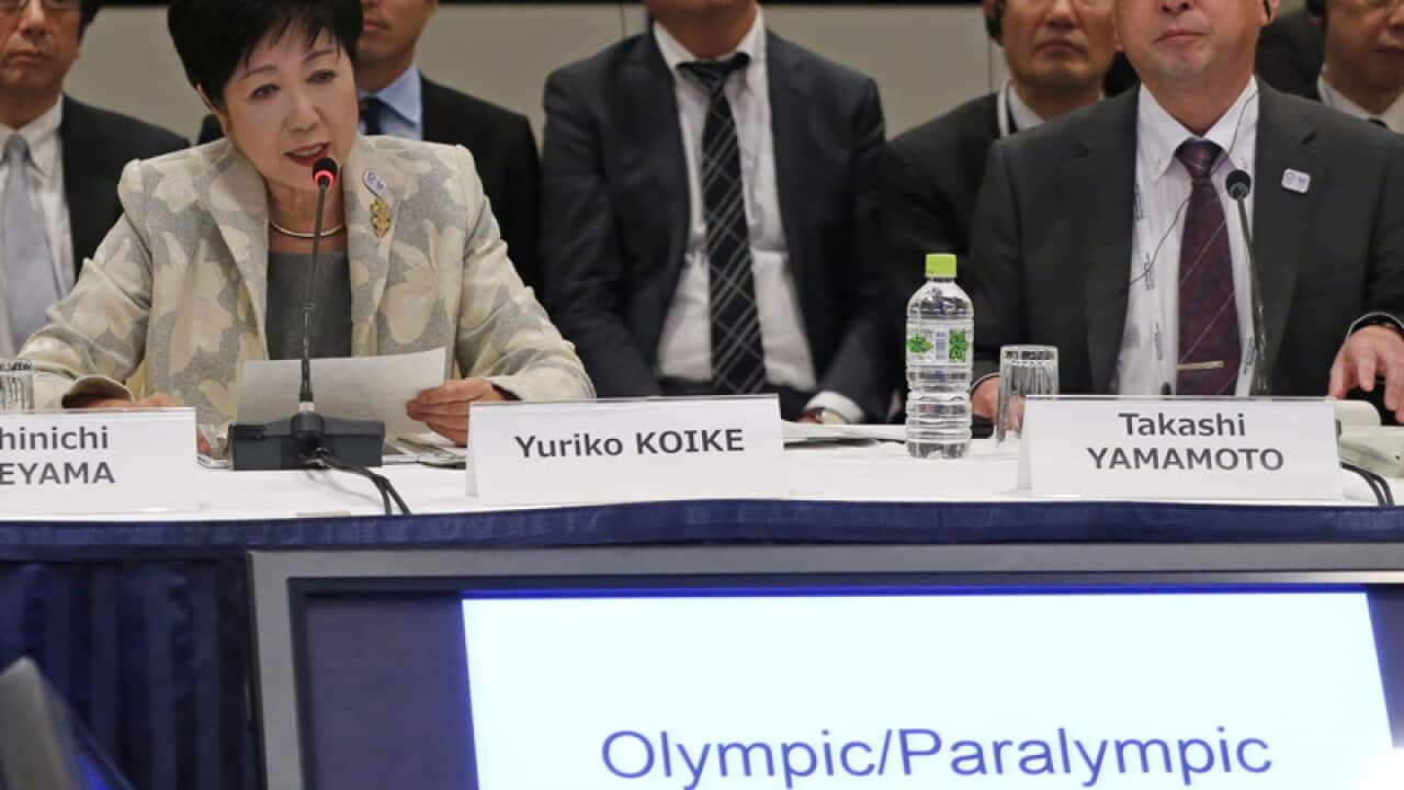 Tokyo Gov. Yuriko Koike speaks at the IOC debriefing meeting in Tokyo
