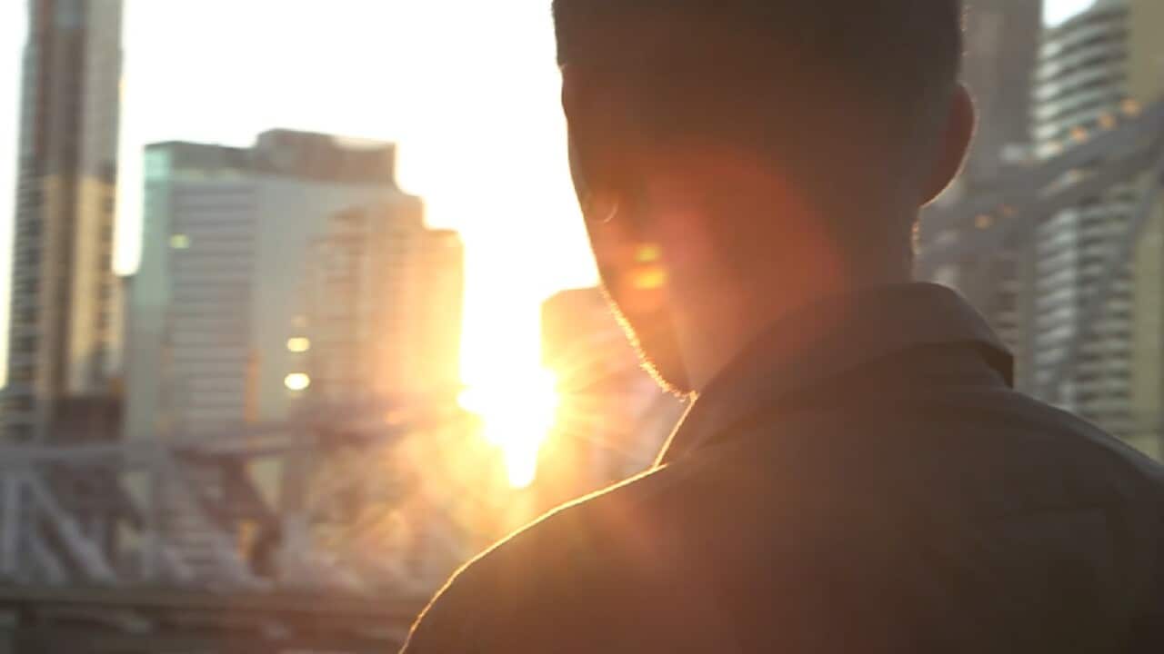 Man silhouetted in the sun (SBS)