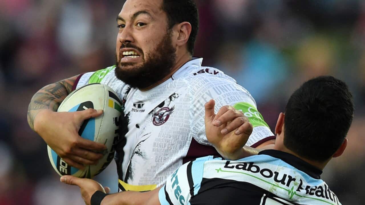 Feleti Mateo (left) of the Sea Eagles
