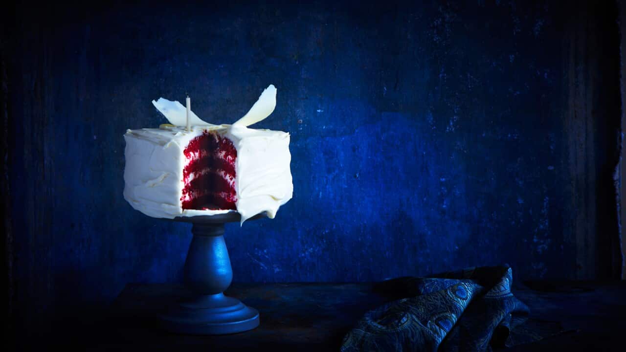 Red velvet layer cake with fresh raspberries and mascarpone icing