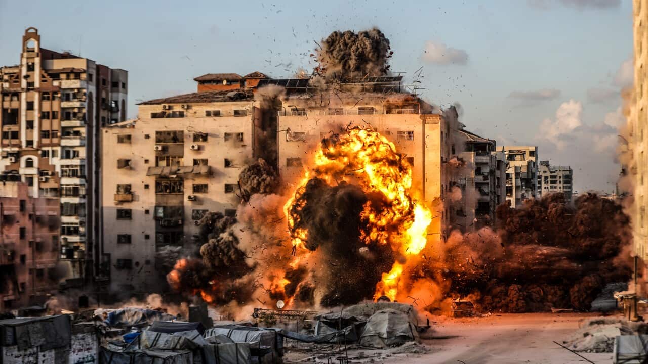 Israeli Airstrike hits al-Ruya Tower in Gaza City, large fireball seen