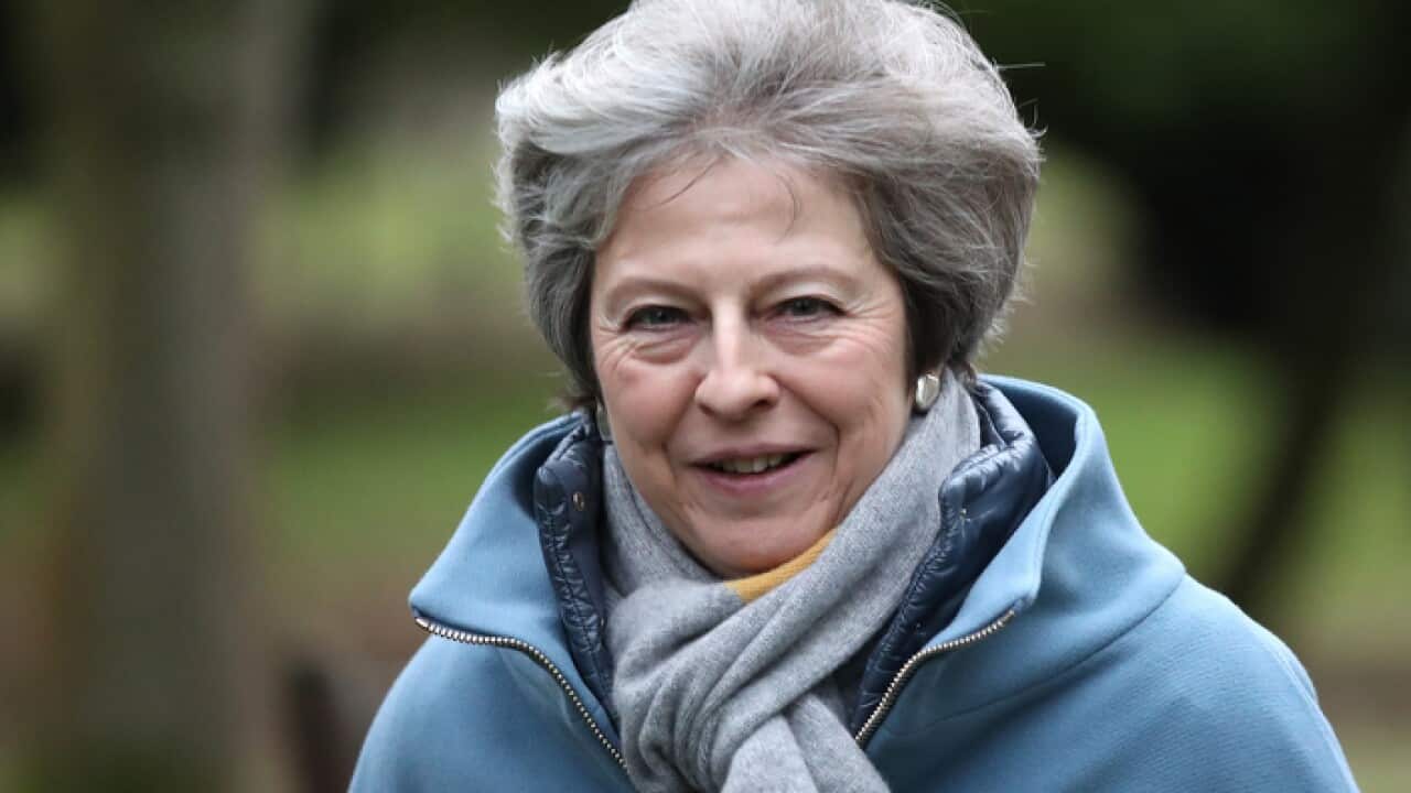 Theresa May attends church