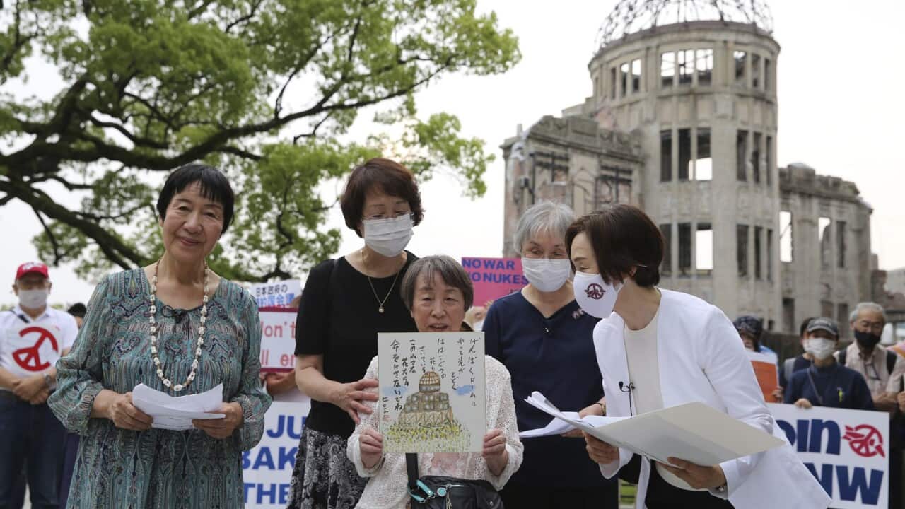 Atomic Bomb survivors in front of Hiroshima's A-Bomb Dome ask Japan's government to join the Treaty on the Prohibition of Nuclear Weapon
