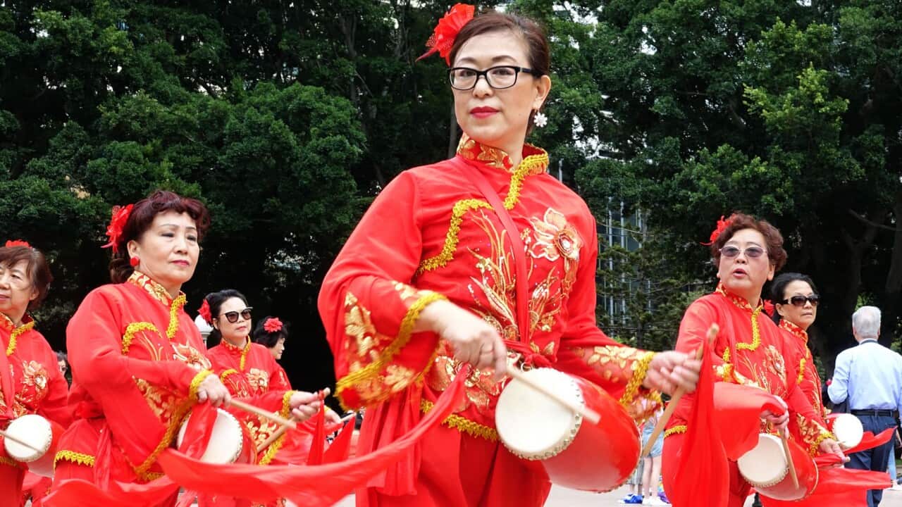 Asian Women at Work drumming group perform part in the Sydney International Women's Day March 'Stop the Silence! End the Violence!' in Sydney, Saturday, March 10, 2018. (AAP Image/Ben Rushton) NO ARCHIVING