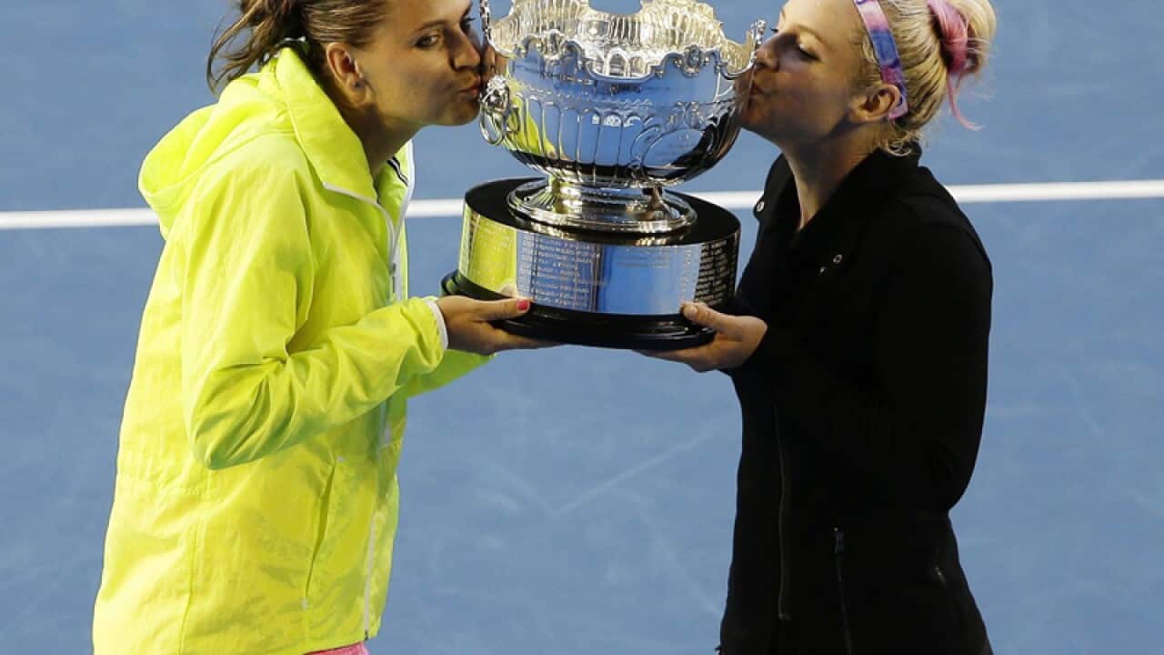 Doubles partners Bethanie Mattek-Sands (R) and Lucie Safarova
