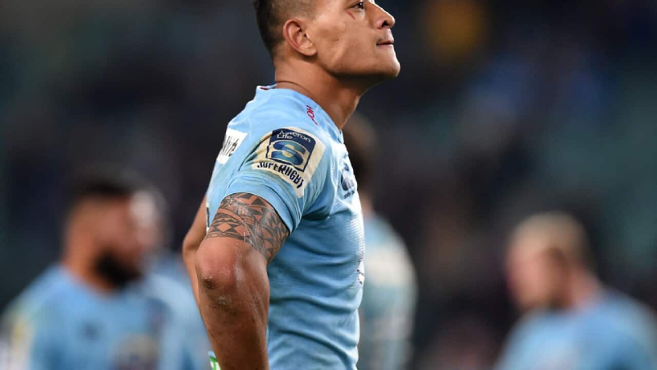 A dejected Israel Folau of the Waratahs