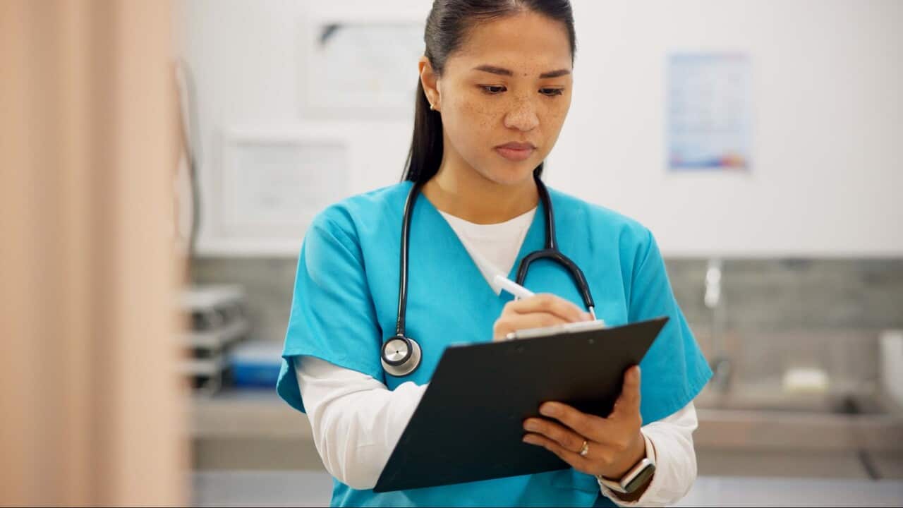 Asian woman, vet and writing with clipboard for results on animal medicine, study or diagnosis at clinic. Young female person or veterinarian taking notes for medical prescription or pet treatment