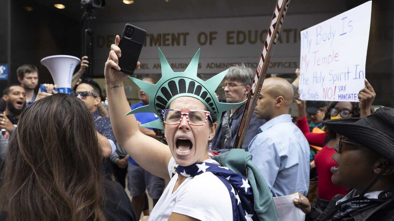 People protest against the New York Citys COVID-19 vaccine mandate for public school employees