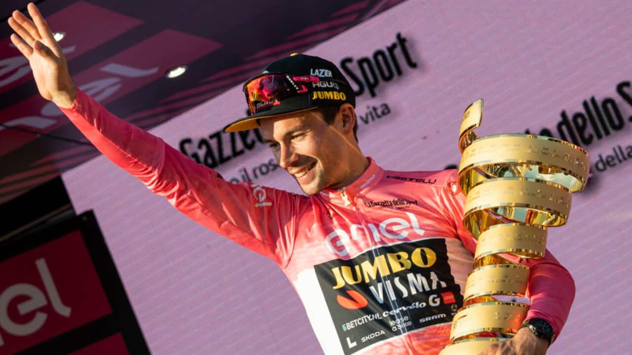 Primoz Roglic celebrates after winning the Giro d'Italia
