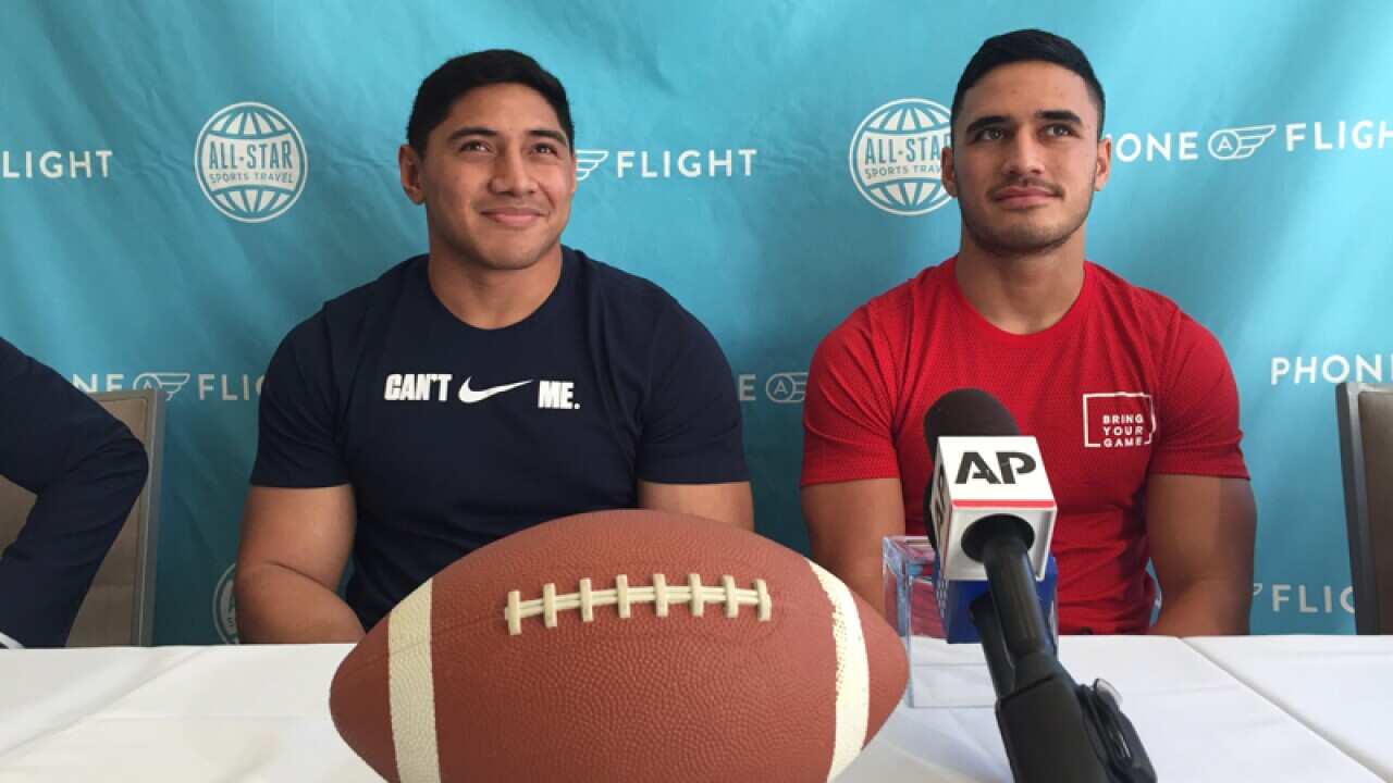 NRL Players Jason Taumalolo (left) and Valentine Holmes