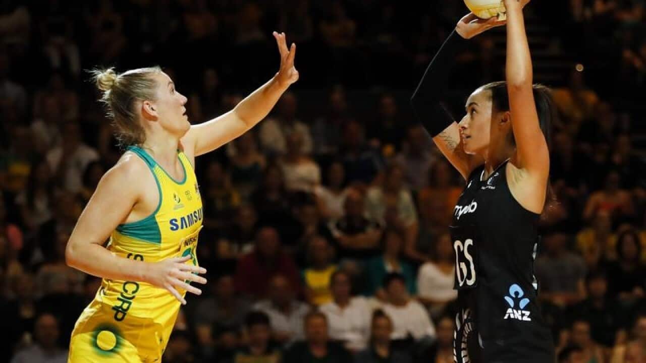 Maria Folau of the Silver Ferns shoots the ball.