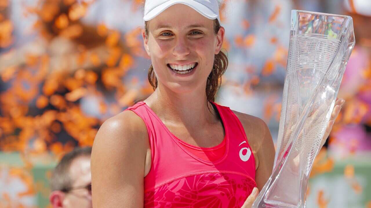 Johanna Konta of Britain holds the winner's trophy