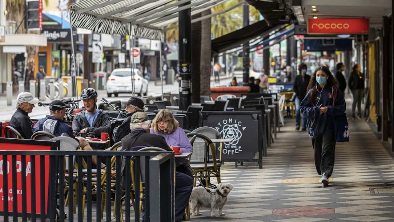 People enjoy a coffee St Kilda, Melbourne, Saturday 23 October 2021