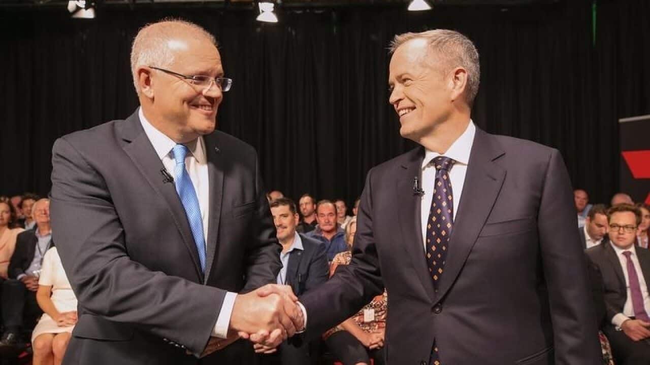 Scott Morrison and Bill Shorten shake hands before the first debate.