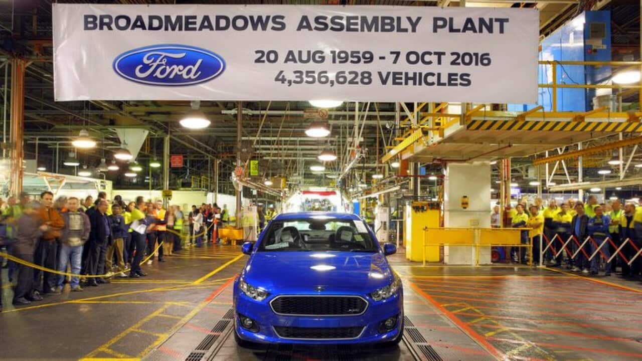 The world's last six-cylinder, rear-wheel drive Falcon XR6 rolls off the assembly line at its Broadmeadows plant in Melbourne