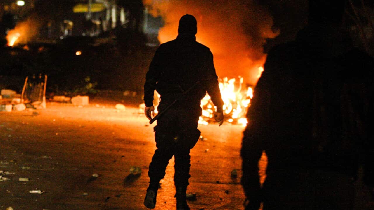 Tunisian Police officers during clashes,Tunisia
