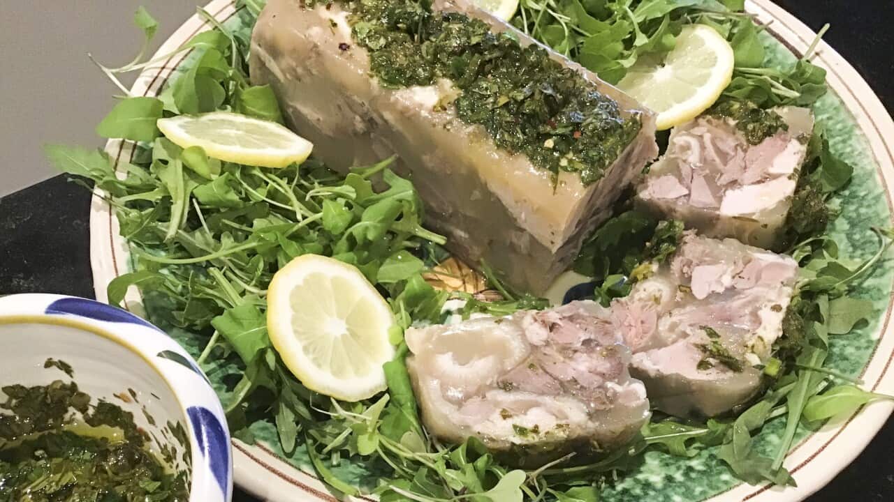 Sicilian pork terrine sliced on a bed of leaves