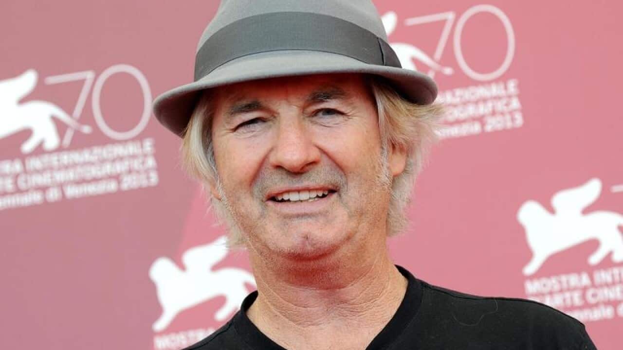 Australian actor John Jarratt poses at a photocall for 'Wolf Creek 2'.