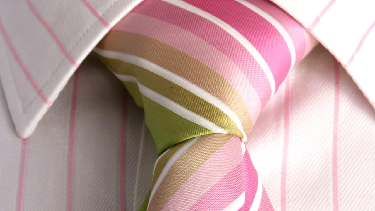 Close up of tie on neck