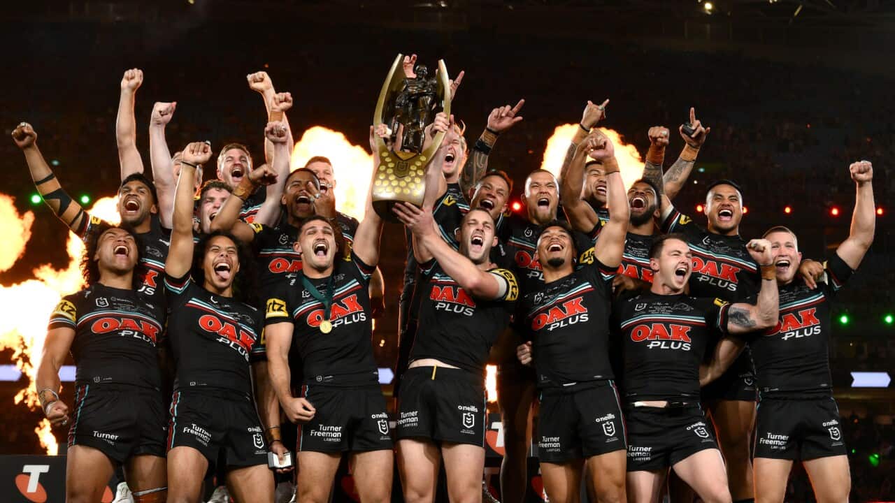 Panthers players celebrate after winning the NRL Grand Final between the Brisbane Broncos and Penrith Panthers at Accor Stadium in Sydney