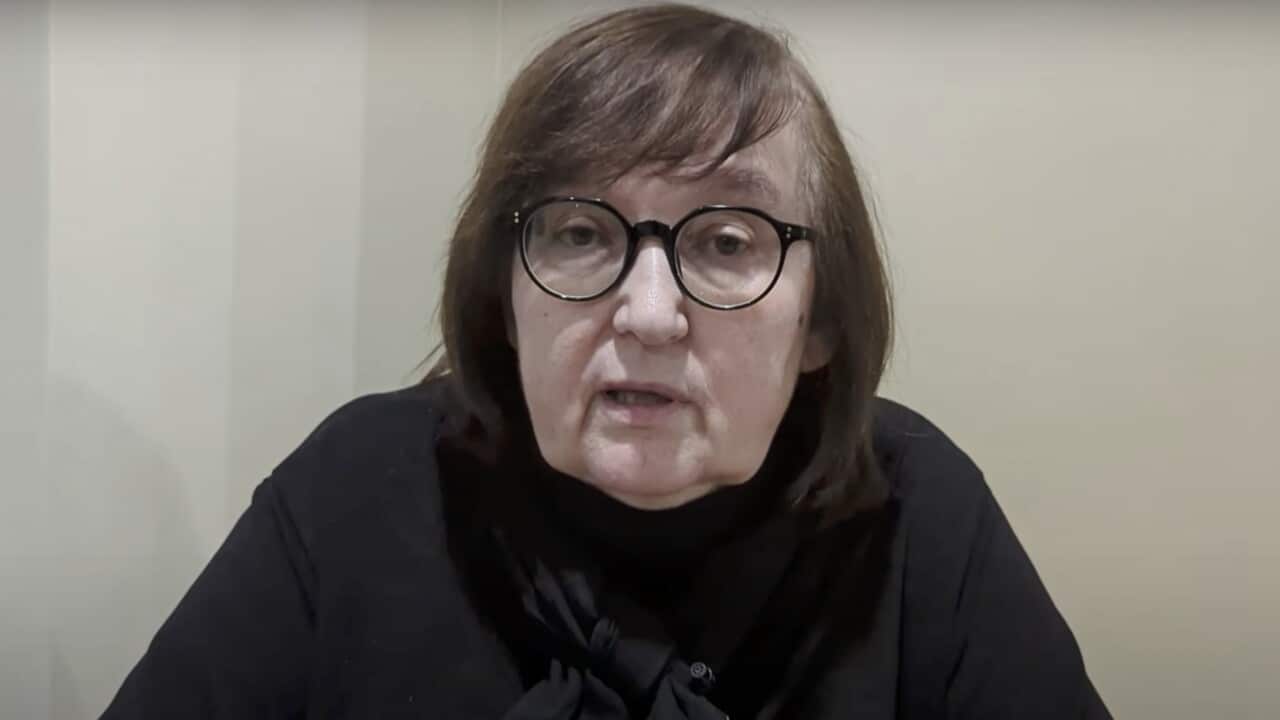 A woman wearing glasses