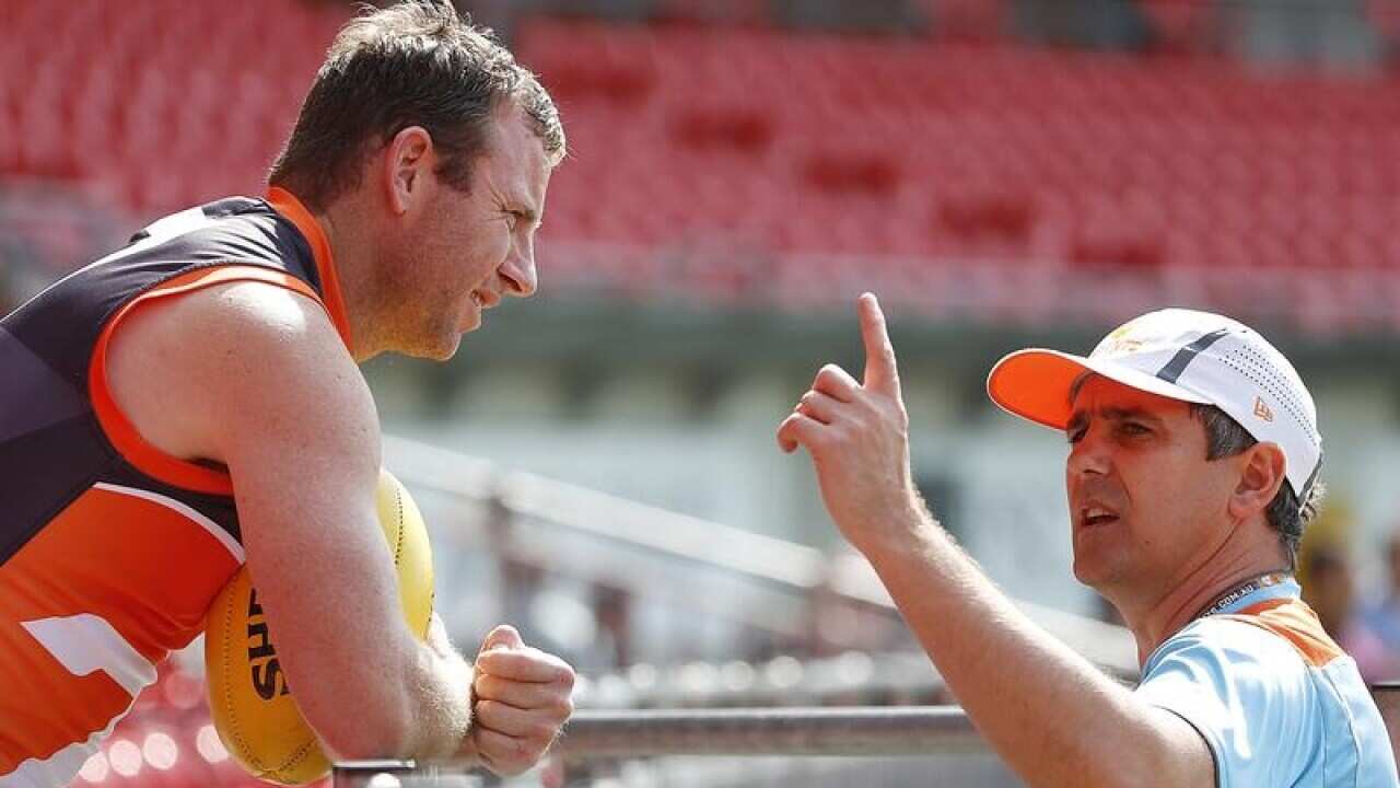 Steve Johnson of GWS Giants (L), head coach Leon Cameron
