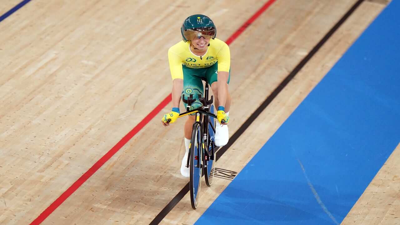 Australia's Paige Greco celebrates winning Gold in the Women's C1-3 3000m Individual Pursuit on day one of the Tokyo 2020 Paralympic Games in Japan.
