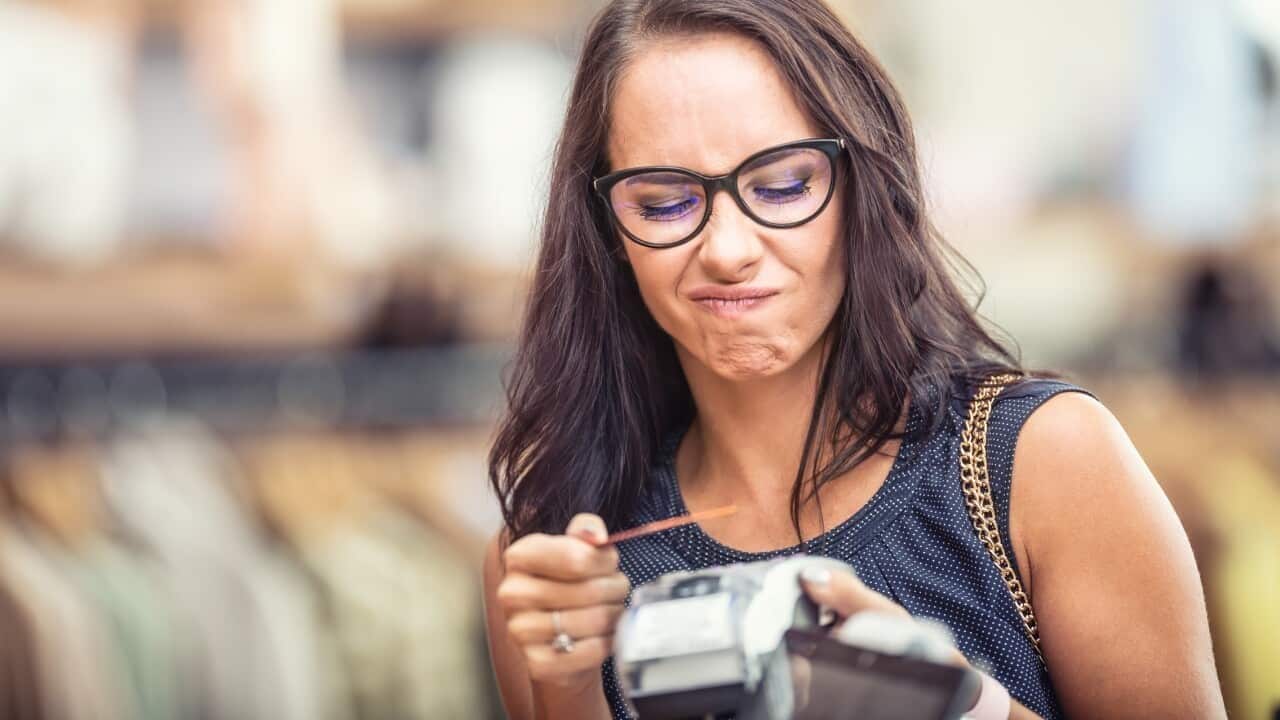 Woman unhappy about payment declined on the terminal while trying to use her credit card.jpg