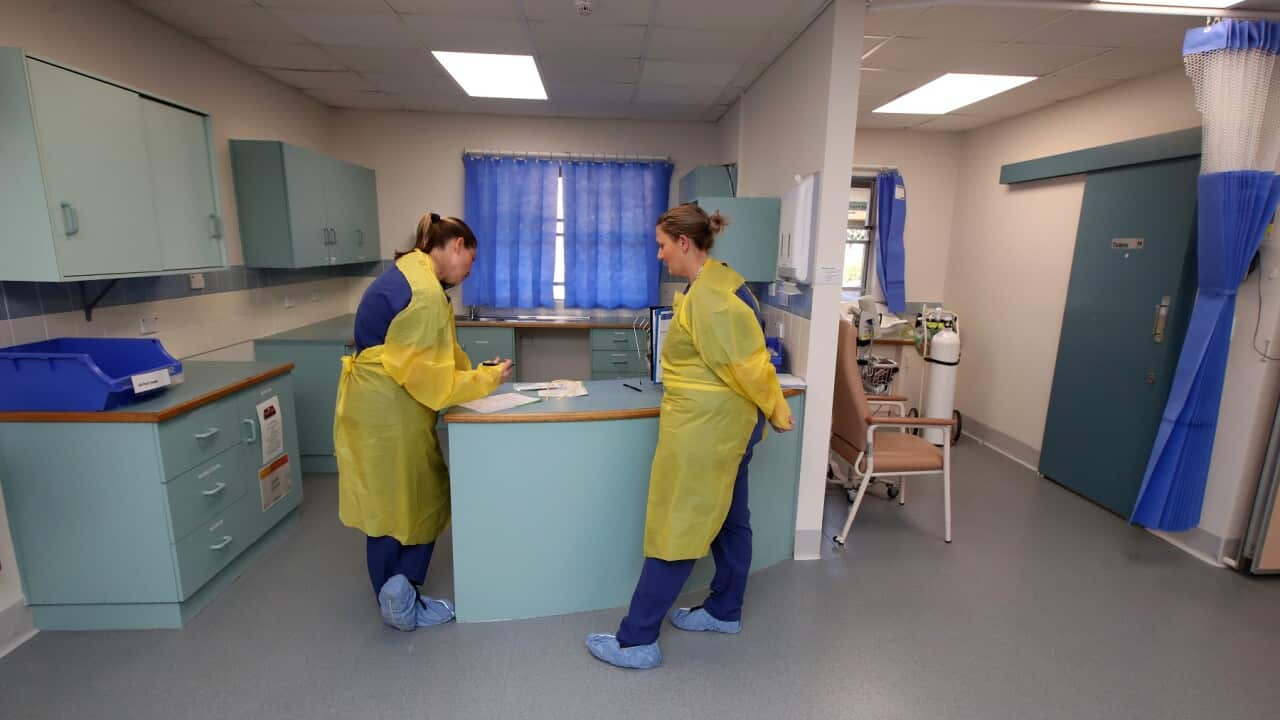 Healthcare workers are seen at the newly opened COVID-19 Clinic at the Mount Barker Hospital in Adelaide, 17 March 2020.