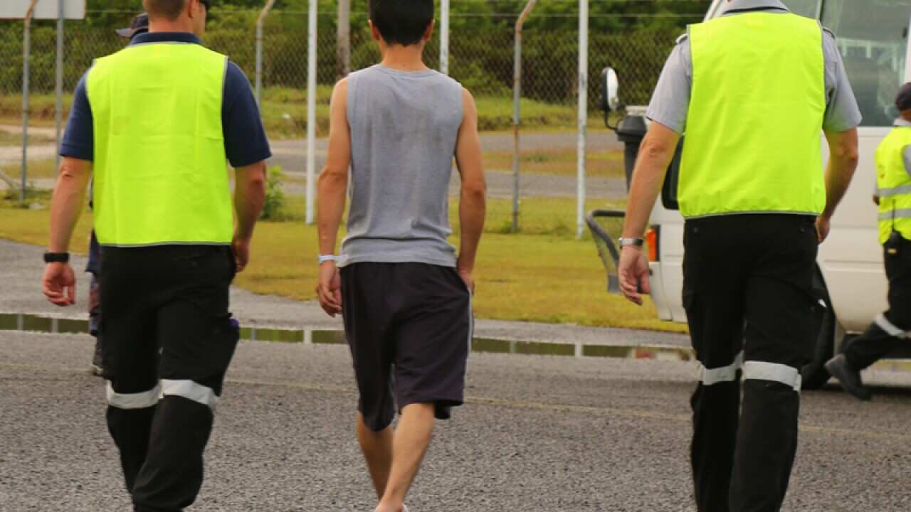 An asylum seeker arrives on Manus Island