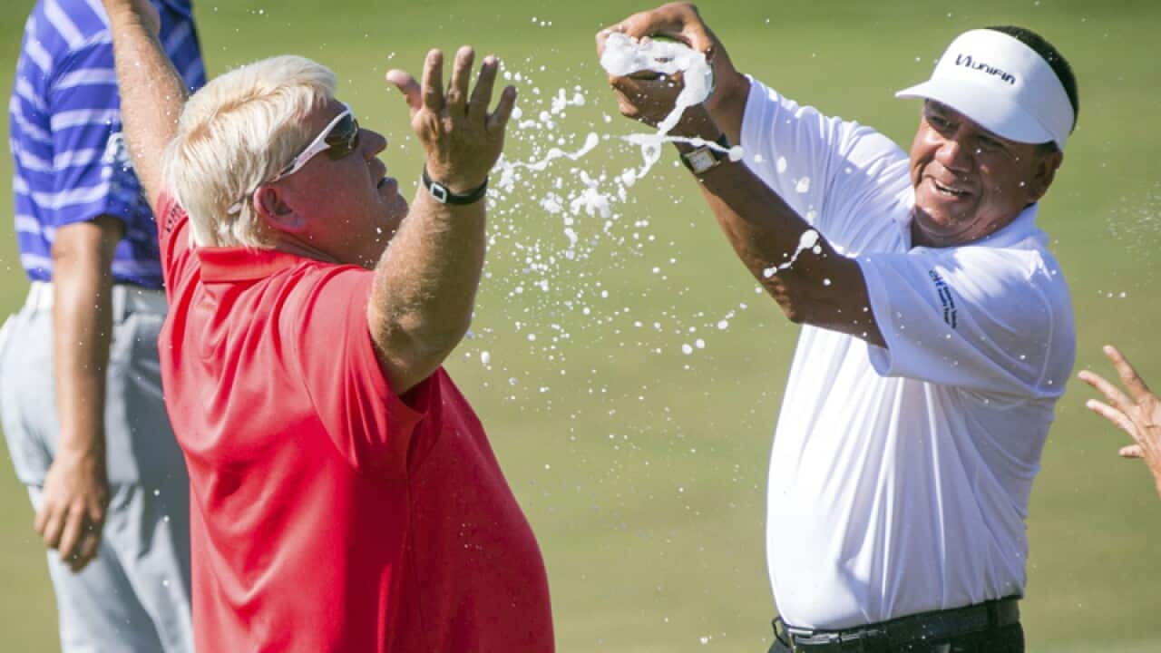 John Daly is doused after winning the Insperity Invitational