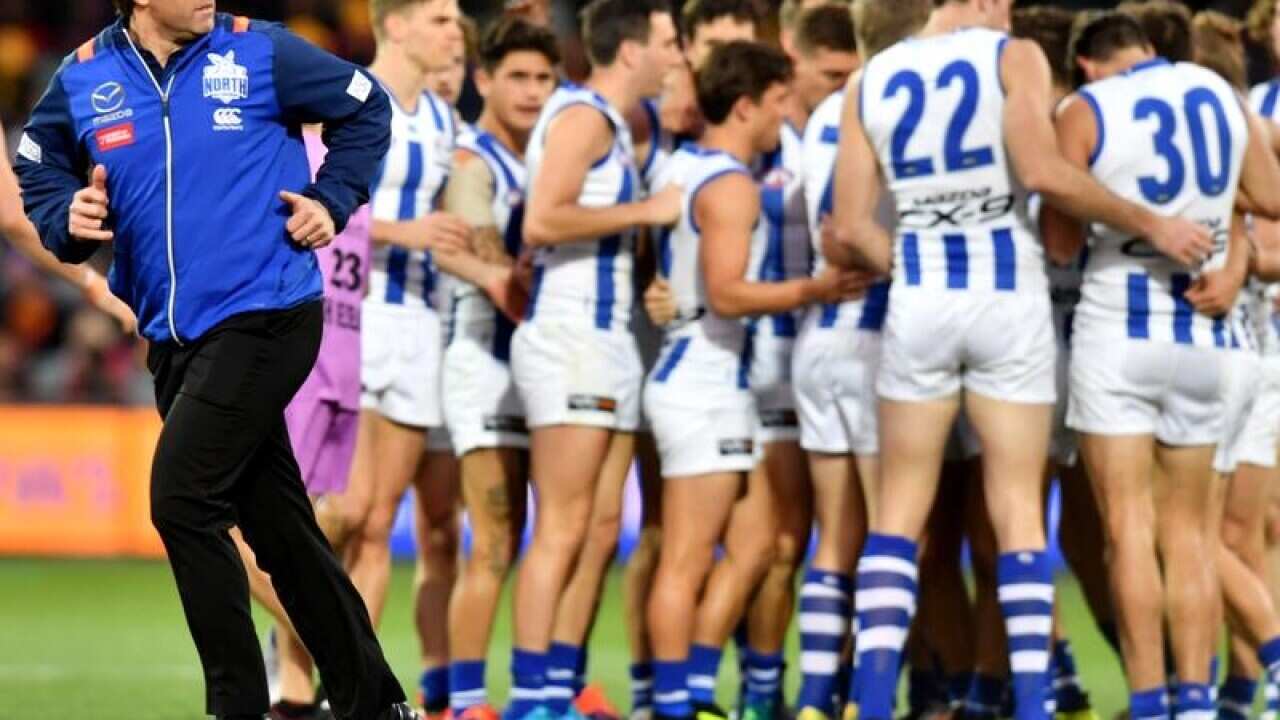 North Melbourne Kangaroos coach Brad Scott (L)