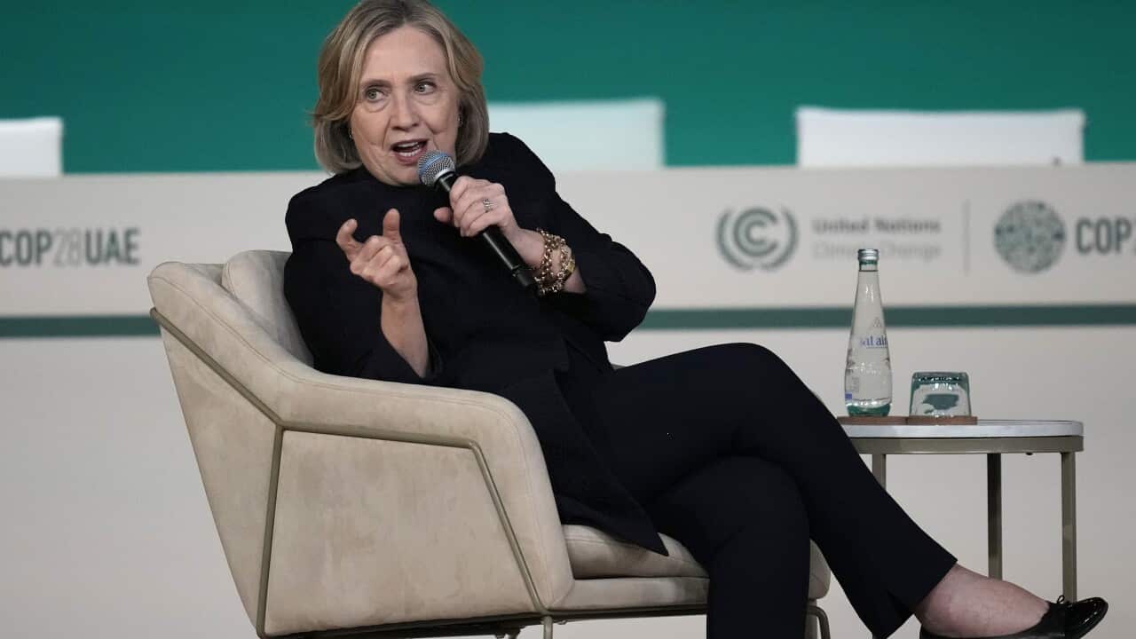 Hillary Clinton speaks during a session on women building a climate resilient world at COP28
