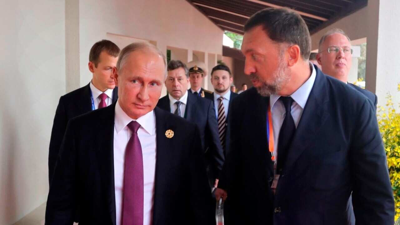 This Nov. 10, 2017, file photo shows Russia's President Vladimir Putin, left, and Russian metals magnate Oleg Deripaska